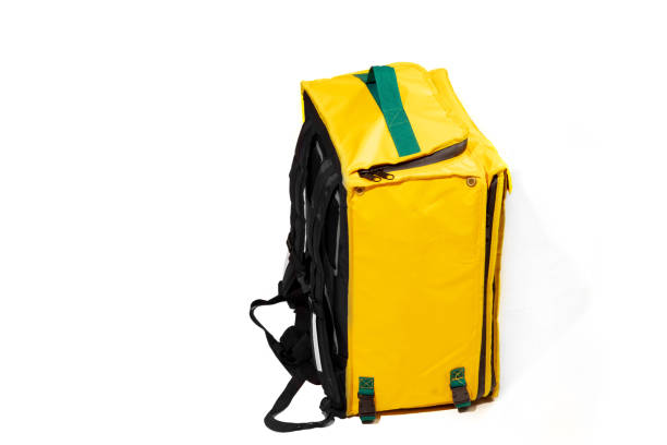 Thermal yellow bag isolated on white studio background with copyspace. For food transportation and delivery service.