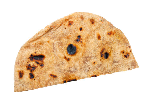 tandoori roti (naan flatbread) isolated on white Indian cuisine - tandoori roti (naan flatbread baked in tandoor ) isolated on white background pita bread isolated stock pictures, royalty-free photos & images