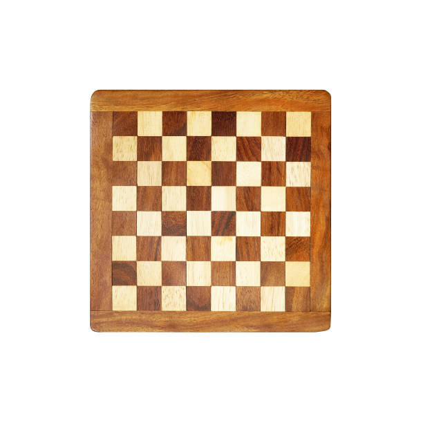 istock Chess board isolated on white background, top view. Handmade chessboard assembled from pieces of different wood 1225953718