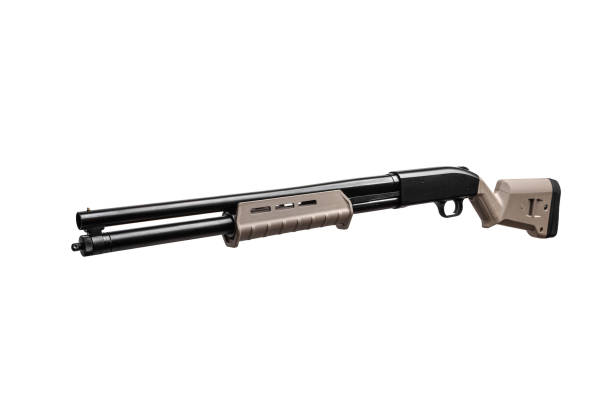 istock Modern pump-action shotgun with a plastic butt and fore-end isolate on a white background. Weapons for sports and self-defense. Armament of police, army and special units. 1225954073