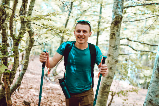 istock Handsome Male Enjoying Forest Tranquility During Hiking 1225957015