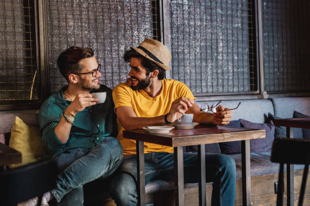 istock Two gay men in a bar 1225957096