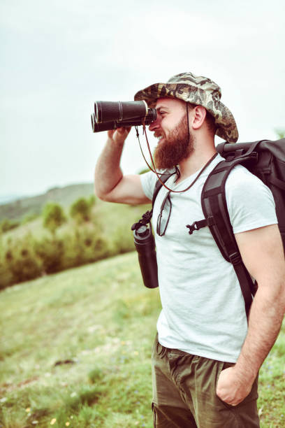 istock Happy Male Enjoying Beautiful Mountain View 1225957423