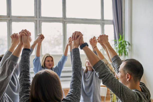 istock friendly members of alcoholics club 1225960238