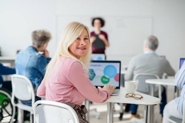istock Portrait of senior attending computer and technology education class. 1225960476