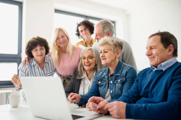 istock Group of senior people attending computer and technology education class. 1225961174