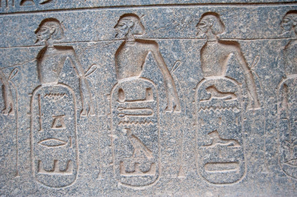 istock Hieroglyphic carvings on an ancient egyptian temple wall 1225961860