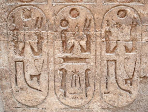 istock Hieroglyphic carvings on an ancient egyptian temple wall 1225961867