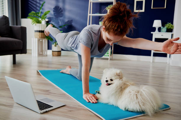 istock Woman doing some yoga exercises at home 1225962055