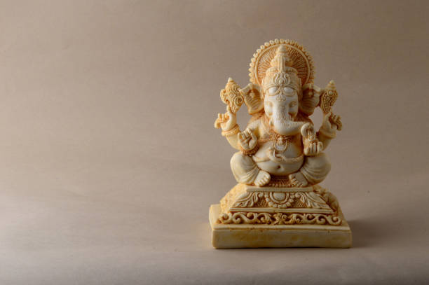 istock Hindu God Ganesha. Ganesha Idol on background 1225963944