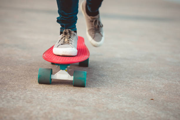 istock Skateboarder legs skateboarding at outdoors 1225965187