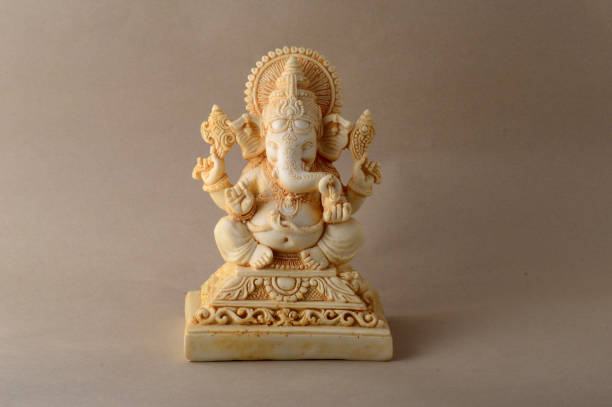 istock Hindu God Ganesha. Ganesha Idol on background 1225965384