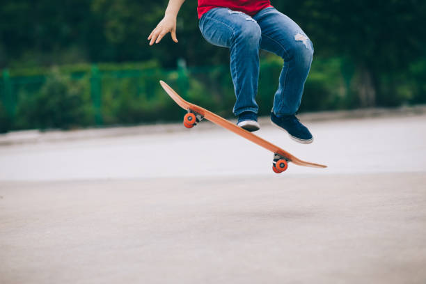 istock Skateboarder legs skateboarding at outdoors 1225965390