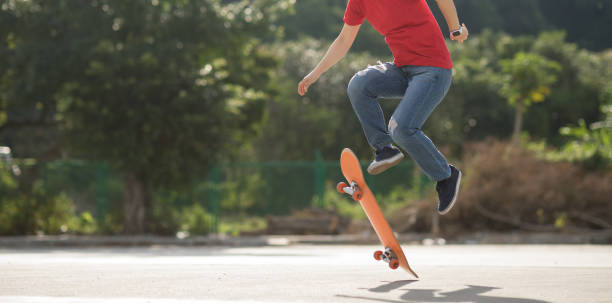 istock Skateboarder legs skateboarding at outdoors 1225965550