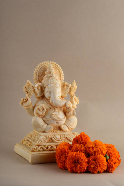 istock Hindu God Ganesha. Ganesha Idol on background 1225966632