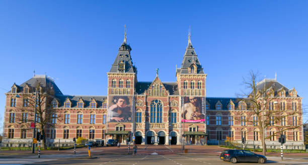 Rijksmuseum Amsterdam during a quiet springtime morning in the Capitol of The Netherlands. The Rijksmuseum is temporary closed due to the corona crisis.