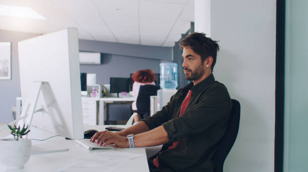 istock Finishing up the last of his work 1225968521