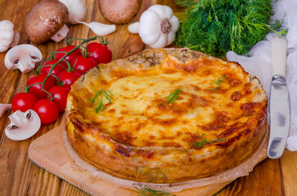 istock Baked pancakes (crepes) with mushrooms and bechamel sauce 1225968590