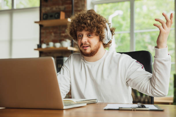 istock Manager or student working from home while being insulated or keep quarantine 'cause of coronavirus COVID-19. Online meeting. 1225968634