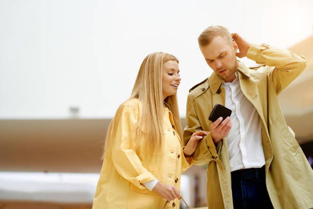 istock sad man look at his empty wallet, nothing to give for girlfriend 1225970262