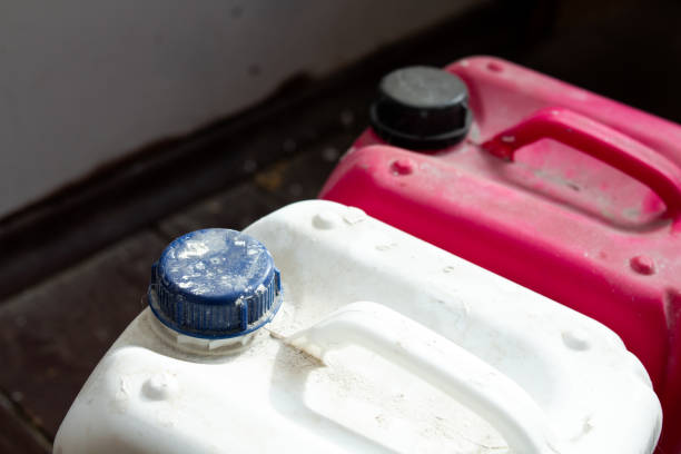 istock dirty plastic canisters for repairing the mixture 1225970388