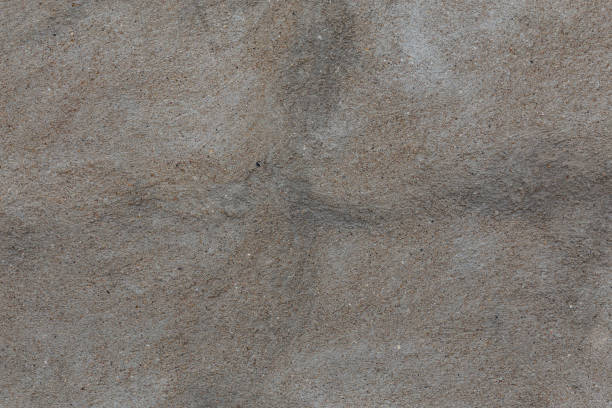 istock dark gray plaster outside wall texture and background 1225972544