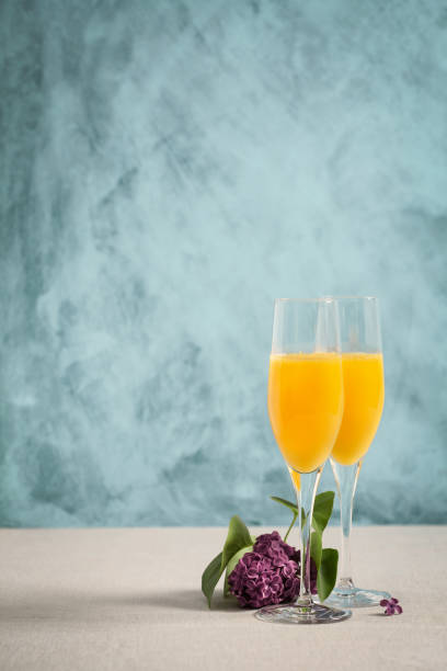 istock Two glasses of mimosa cocktail 1225976551