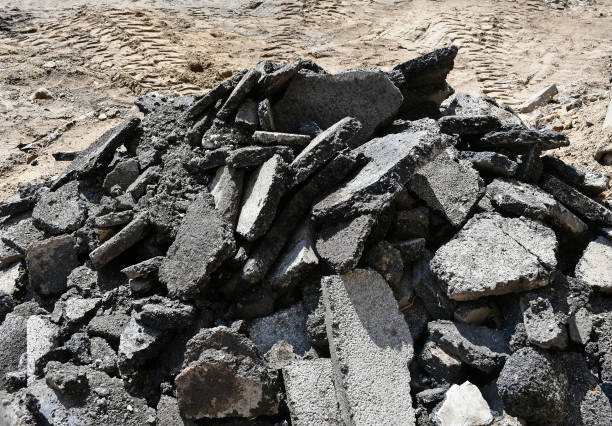 istock Asphalt construction material after braking the road 1225976615