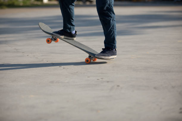 istock Skateboarder skateboarding at morning outdoors 1225977366