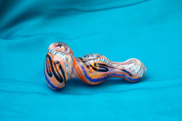 istock Pipe or bong for marijuana smoking 1225978446