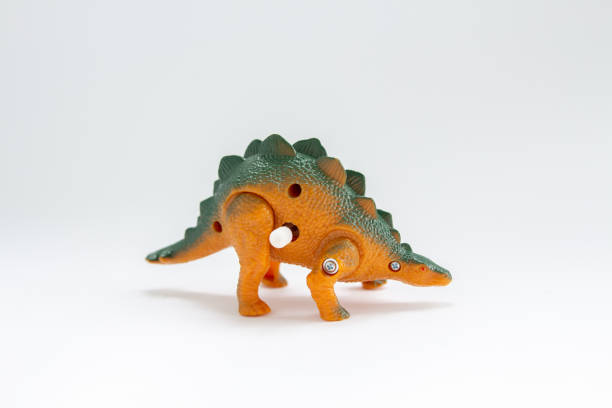 istock toy dinosaur on a white background 1225978481