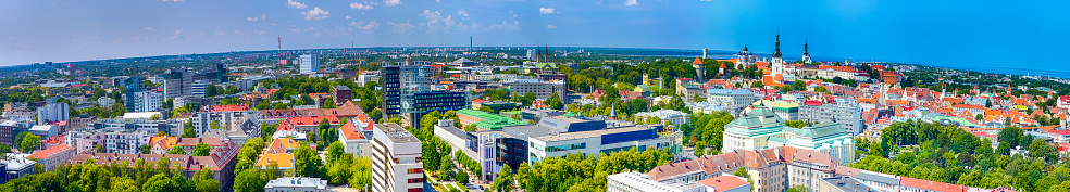 Picturesque View of Tallinn Cityscape in Estonia. Taken from the Top Point in the City with View at Old City Center and Port with Bay. Panorama Image Composition