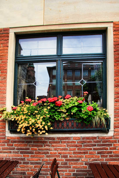 istock Window decoration with flowers. Nuremberg, Bavaria, Germany. 1225984042
