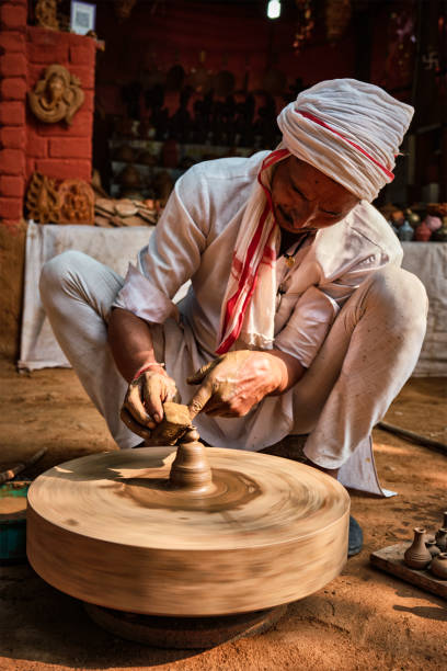 istock Indian potter at work, Shilpagram, Udaipur, Rajasthan, India 1225985777