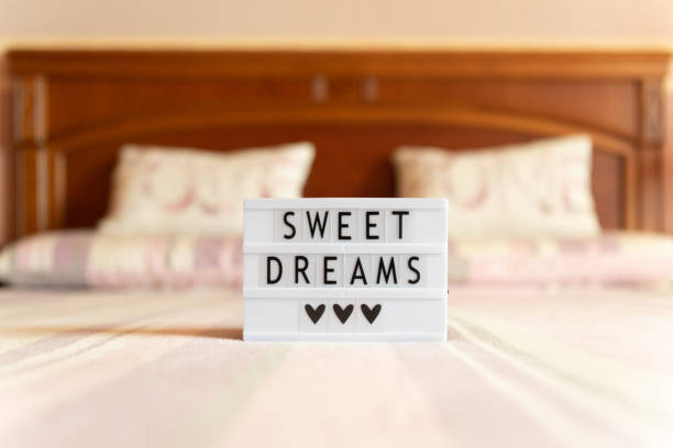 istock Lightbox with text: sweet dreams, on the bed. 1225989865
