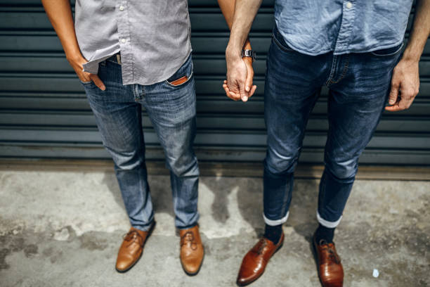 istock Homosexual couple holding hands 1225992596