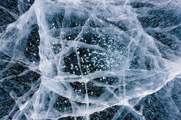 istock Beautiful ice of Lake Baikal with abstract cracks 1225993398