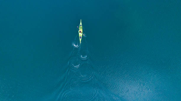 istock A drone shooting a kayak floating in lake 1225994073