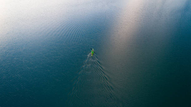 istock A drone shooting a kayak floating in lake 1225994124