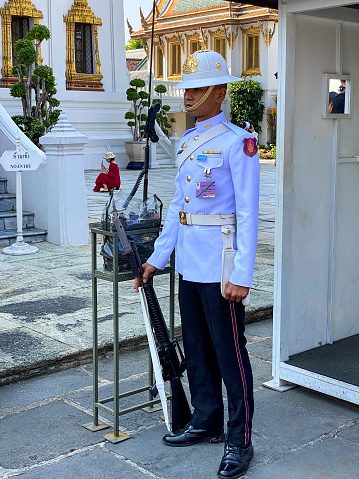 Bangkok, Thailand - November 9, 2019: Guard at the Royal grand palace in Bangkok.