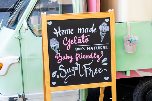 Gluten free, lactose free, gluten free ice cream sign. Advertisement on chalk board