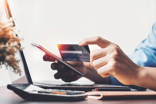 istock People use credit cards, user data entry, and codes for electronic payment technology for online with copy space. shopping lifestyle 1226002053