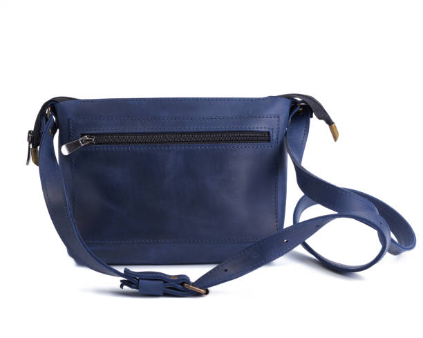 istock blue leather small handbag with a long handle isolated on a white background 1226002804