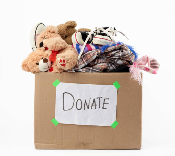 istock brown cardboard box with a white sheet pasted and the inscription donate 1226002903