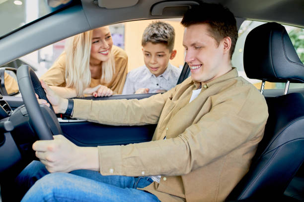 istock caucasian man admires his new car 1226003053