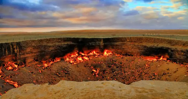 Photo of The Karakum Desert. Turkmenistan. Darvaza. Burning gas crater called 