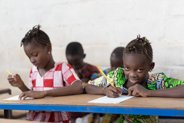 istock Four Beautiful African Students Studying in Classroom School 1226004265
