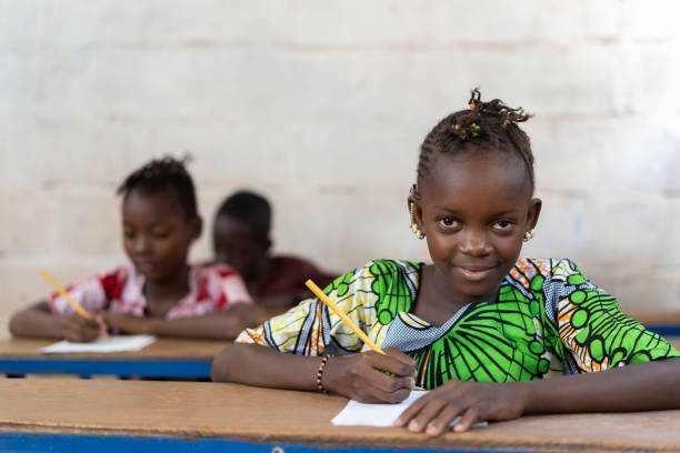 istock Gorgeous African Children Working and Studying in Africa Classroom 1226004627