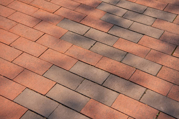 istock Red brick paving stones on a sidewalk 1226004883