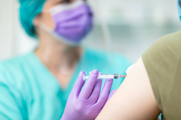 istock Getting a flu shot in the arm 1226005910